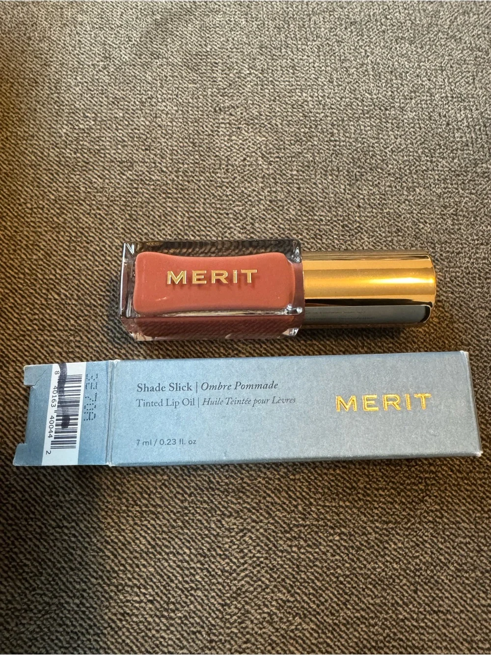 Merit Shade Slick Tinted Lip Oil — Warm Terracotta